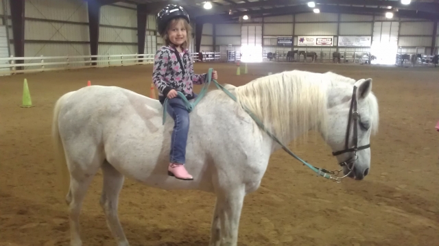 Lylli Jo riding bareback for the first time.  She loves to ride. From Don Mack